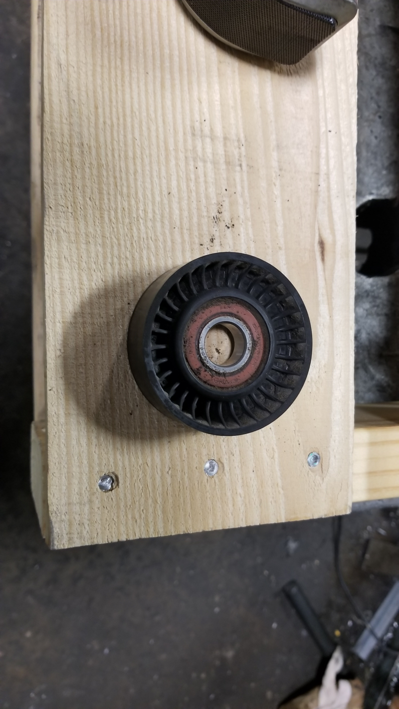 The plastic is molded over the outer race on both sides! Assholes!